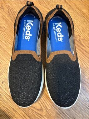 Keds Slip-On Sneakers in Black with Brown Trim and White Sole